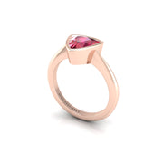 Ruby Solitaire Ring in Trillion Cut 18k rose gold, Zodiac Birthstone Ring, designed for women, perfect astrology jewelry from Celestial Vibe collection at AUWL Assembly