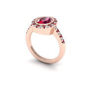 Ruby Halo Ring in Oval Cut 18k rose gold, Zodiac Birthstone Ring, designed for women, perfect astrology jewelry from Celestial Vibe collection at AUWL Assembly