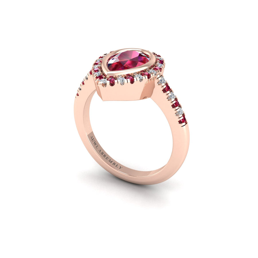 Ruby Halo Ring in Pear Cut 18k rose gold, Zodiac Birthstone Ring, designed for women, perfect astrology jewelry from Celestial Vibe collection at AUWL Assembly