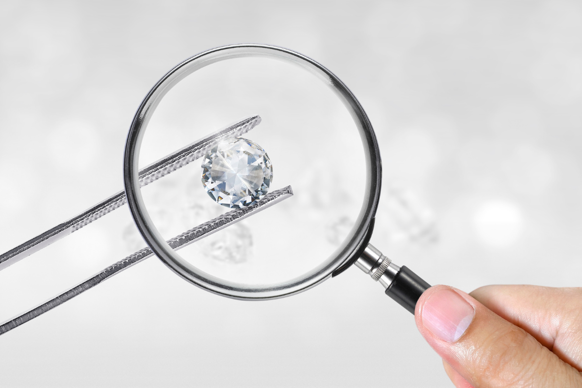 Diamond getting checked under magnificant glass | AUWL Assembly