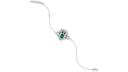 A delicate white gold chain bracelet featuring a central owl-shaped setting with a green oval gemstone and small clear accent stones, shown on a plain white background.