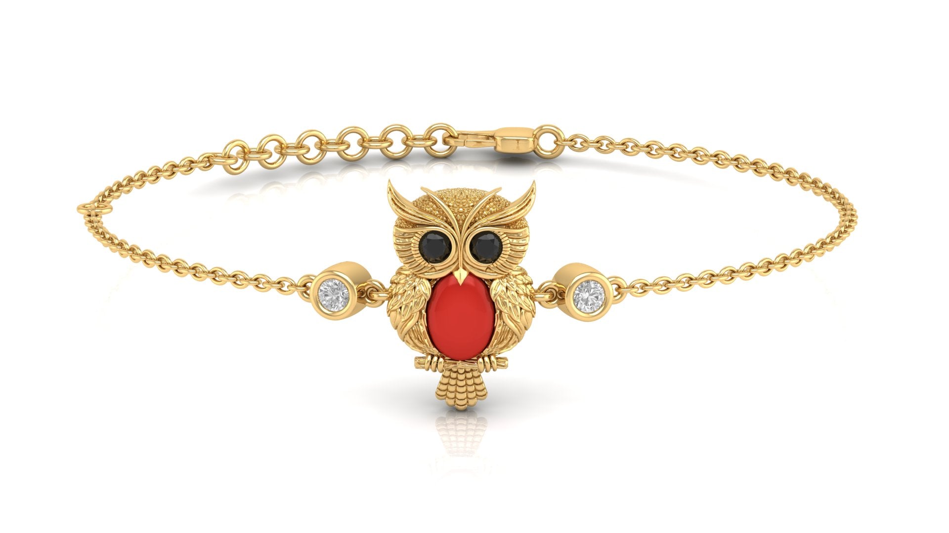 A gold chain bracelet featuring a central owl pendant with a Red coral-cut chest, black eyes, and small clear accent stones on either side, shown on a white background.