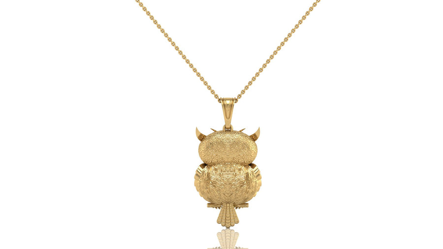 A gold pendant necklace featuring an intricately textured owl design, suspended from a delicate gold chain against a plain white background.