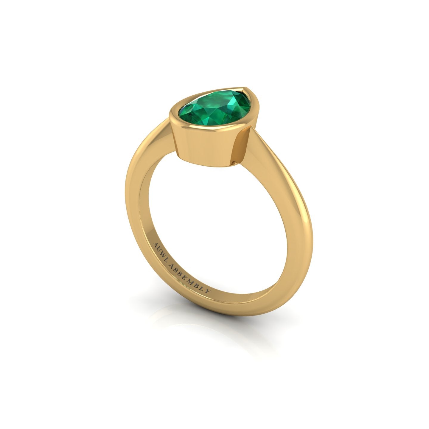 Emerald Solitaire Ring in Pear Cut 18k yellow gold, Zodiac Birthstone Ring, designed for women, perfect astrology jewelry from Celestial Vibe collection at AUWL Assembly