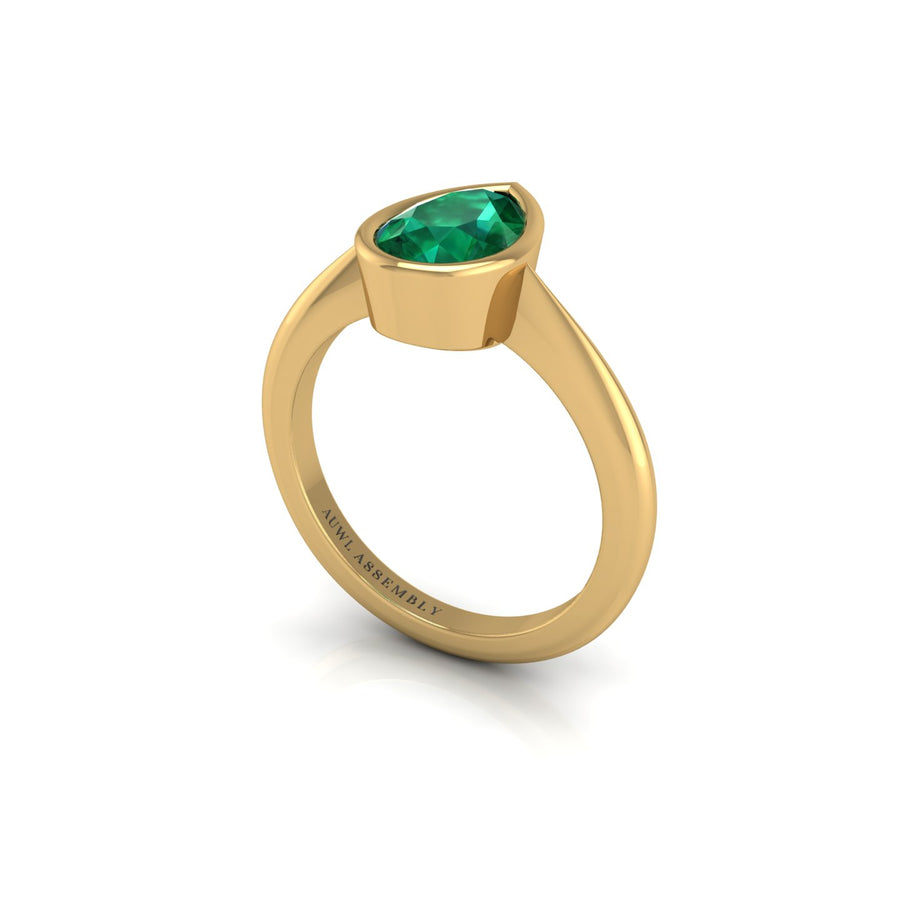 Emerald Solitaire Ring in Pear Cut 18k yellow gold, Zodiac Birthstone Ring, designed for women, perfect astrology jewelry from Celestial Vibe collection at AUWL Assembly