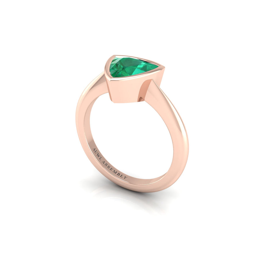 Emerald Solitaire Ring in Trillion Cut 18k rose gold, Zodiac Birthstone Ring, designed for women, perfect astrology jewelry from Celestial Vibe collection at AUWL Assembly