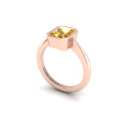 Yellow Sapphire Solitaire Ring in Emerald Cut 18k rose gold, Zodiac Birthstone Ring, designed for women, perfect astrology jewelry from Celestial Vibe collection at AUWL Assembly