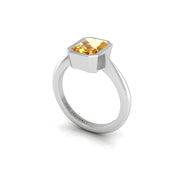 Yellow Sapphire Solitaire Ring in Emerald Cut 18k white gold, Zodiac Birthstone Ring, designed for women, perfect astrology jewelry from Celestial Vibe collection at AUWL Assembly