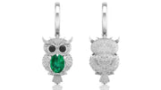 White Gold owl earrings with a green gemstone on a white background