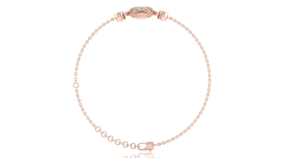 A delicate rose gold chain bracelet with a small oval charm and a matching adjustable lobster clasp, displayed on a clean white background.