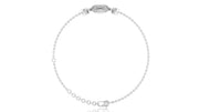 A delicate silver-toned chain bracelet with a small oval diamond centerpiece and clear stones, displayed on a clean white background.