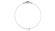 A delicate white gold chain bracelet with a small oval green gemstone centerpiece and clear stones, displayed on a clean white background.