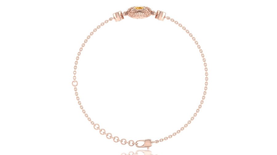 A delicate rose gold chain bracelet with a small oval yellow sapphire gemstone accent and a matching rose gold clasp, displayed on a clean white background.