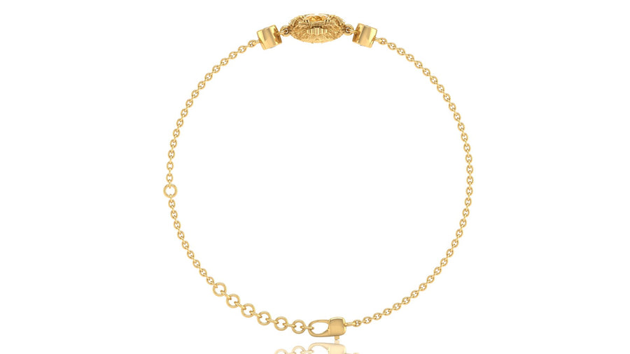 A delicate yellow gold chain bracelet with a decorative oval clasp featuring a Yellow sapphire gemstone, displayed on a clean white background.