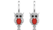 White Gold owl earrings with red coral gemstones on a white background