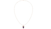 A delicate rose gold necklace featuring an owl pendant with a deep blue sapphire central stone and small pink gemstone accents, displayed on a clean white background.