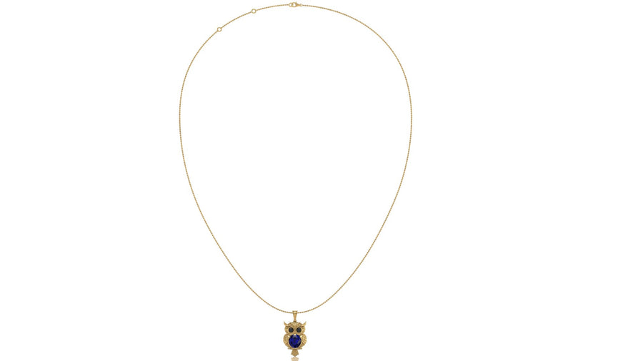 A delicate gold chain necklace featuring an owl pendant with blue sapphire centrestone, displayed against a solid white background.