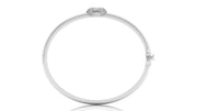 A polished white gold circular bangle bracelet with a small oval cluster of clear Diamond gemstone at the top, shown on a clean white background.