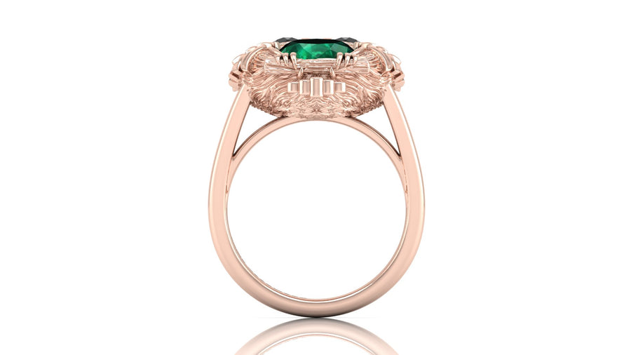 Rose gold ring with a green gemstone on a white background
