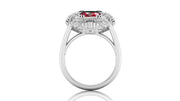 White Gold ring with a ruby gemstone on a white background