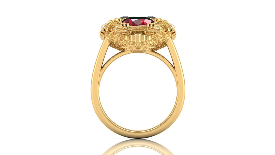 Gold ring with a ruby gemstone on a white background