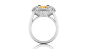 White Gold ring with a yellow sapphire gemstone on a white background