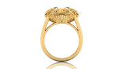 Gold ring with a yellow sapphire gemstone on a white background