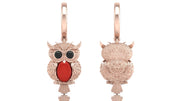 Rose gold owl-shaped earrings with red coral gemstones on a white background