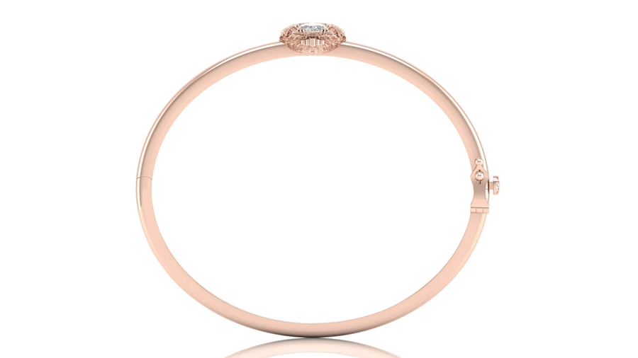 A rose gold bangle bracelet with a small oval Diamond gemstone at the top, shown on a plain white background.