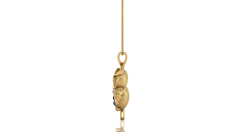 A gold pendant necklace featuring a detailed owl figure with a small dark blue stone accent, hanging from a gold chain against a plain white background.