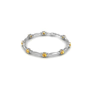 18k white gold Zodiac birthstone bracelet with yellow sapphire gemstone, designed for women, perfect astrology jewelry from Celestial Vibe collection