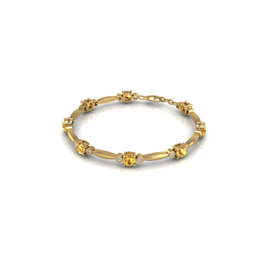 18k yellow gold Zodiac birthstone bracelet with yellow sapphire gemstone, designed for women, perfect astrology jewelry from Celestial Vibe collection