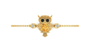 A gold owl pendant bracelet featuring a large Yellow sapphire center stone, black stone eyes, and small clear accent stones on either side, set on a delicate gold chain against a plain white background.