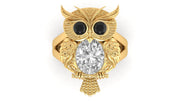 Gold owl-shaped ring with a diamond gemstone on a white background