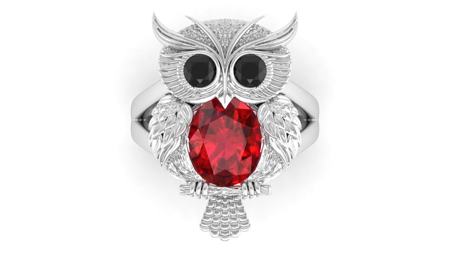 Rose gold ring with ruby and black gemstones on a white background