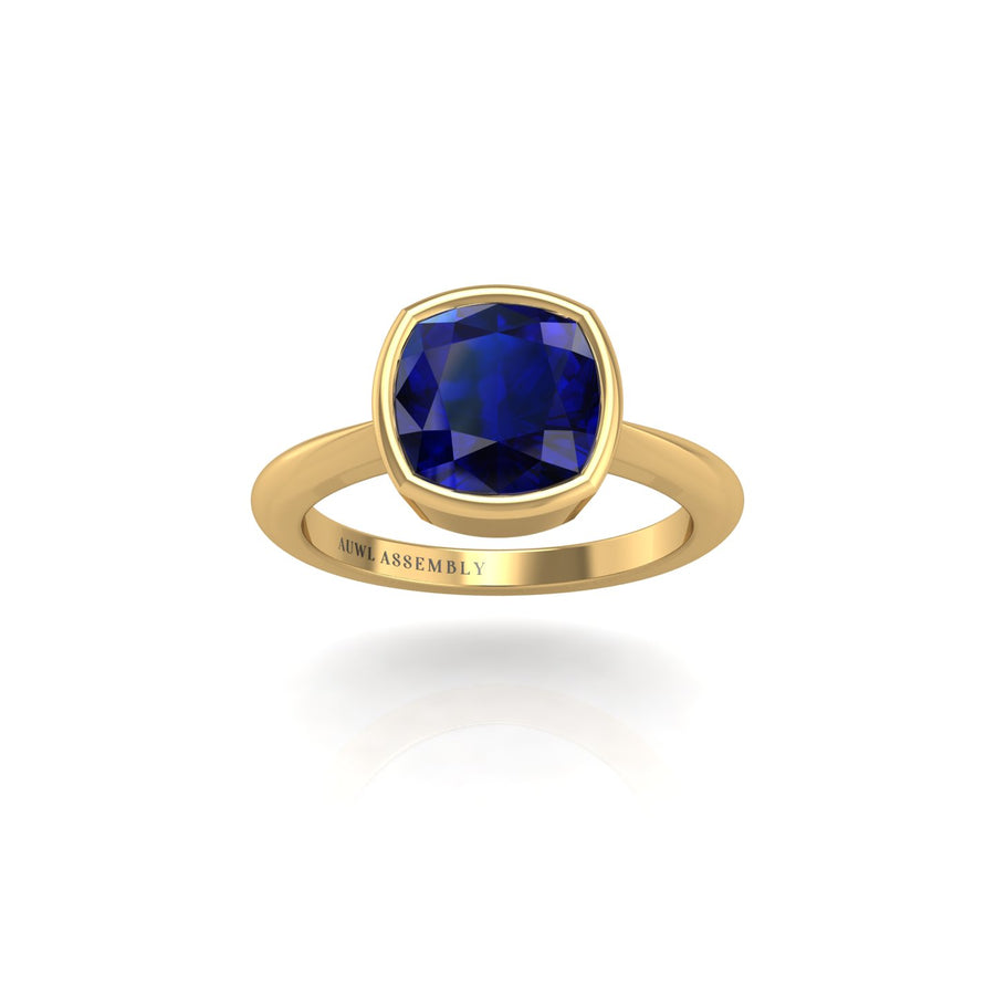 Gold blue sapphire cushion solitaire ring front view
