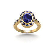 Gold blue sapphire oval halo ring front view