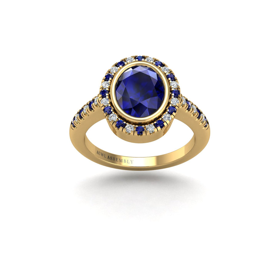 Gold blue sapphire oval halo ring front view
