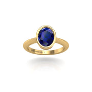 Gold blue sapphire oval solitaire ring front view