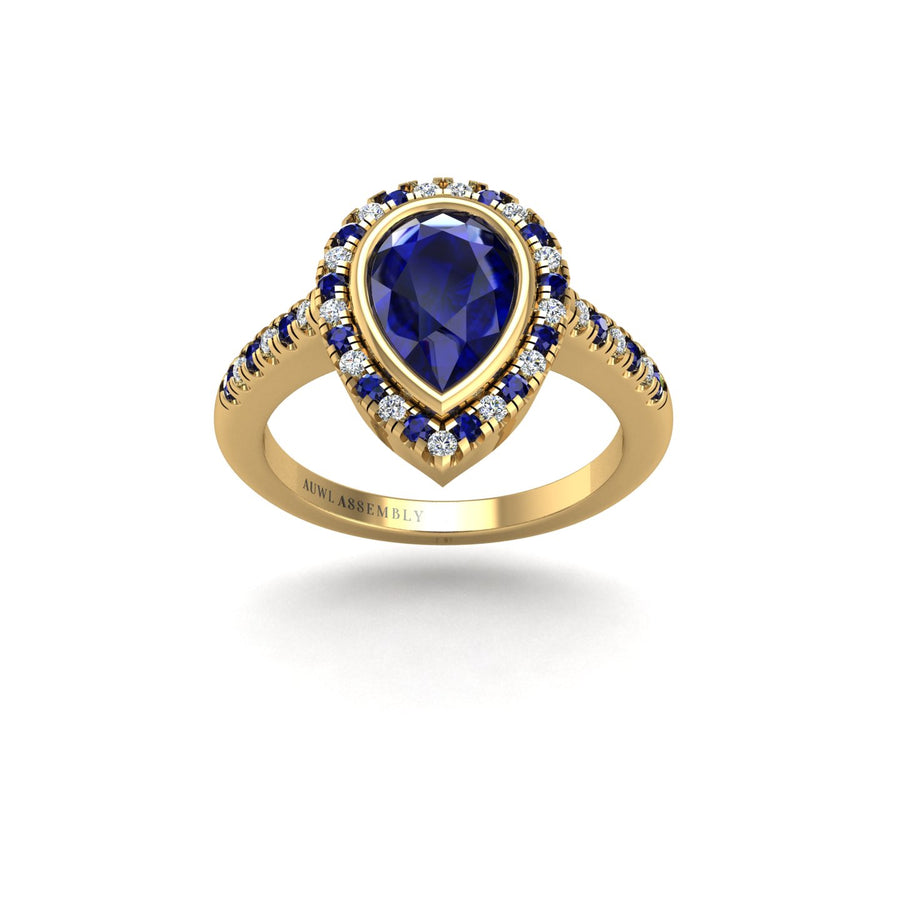 Gold blue sapphire pear halo ring front view