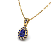 Gold blue sapphire pear heavenly halo pendant