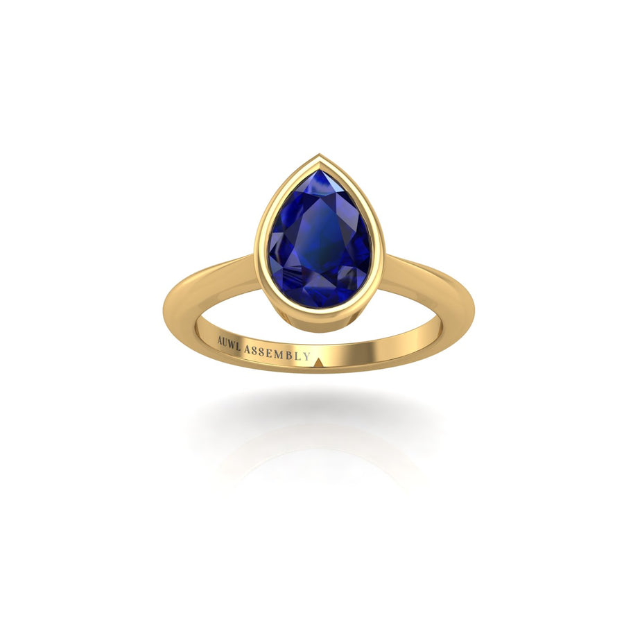 Gold blue sapphire pear solitaire ring front view
