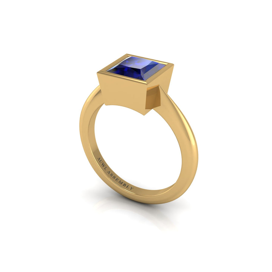 Gold blue sapphire princess solitaire ring