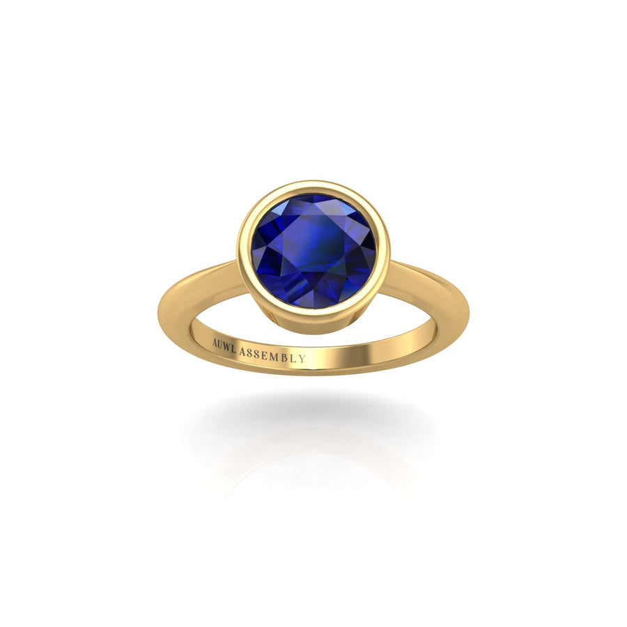 Gold blue sapphire round solitaire ring front view