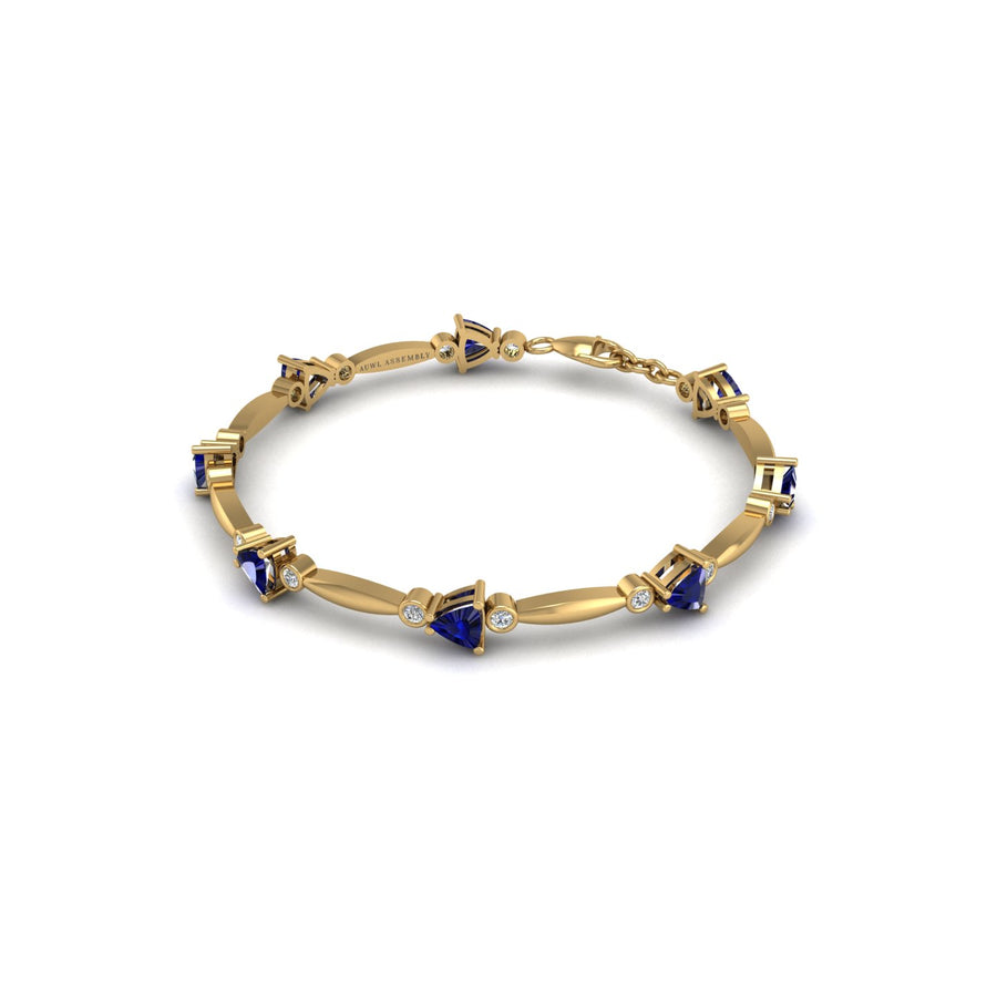 Gold blue sapphire stardust designer bracelet