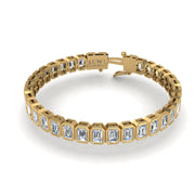 Gold diamond emerald stellar tennis bracelet