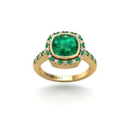 Gold emerald cushion halo ring front view