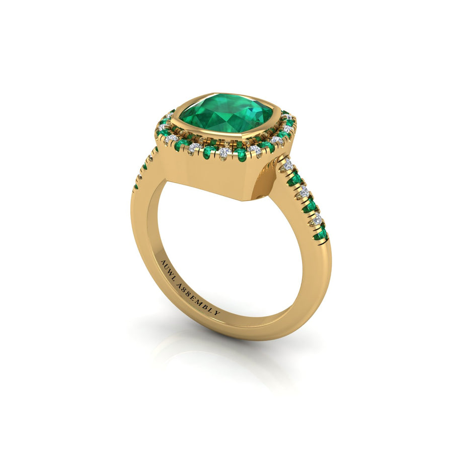 Gold emerald cushion halo ring