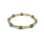 Gold emerald cushion stardust designer bracelet