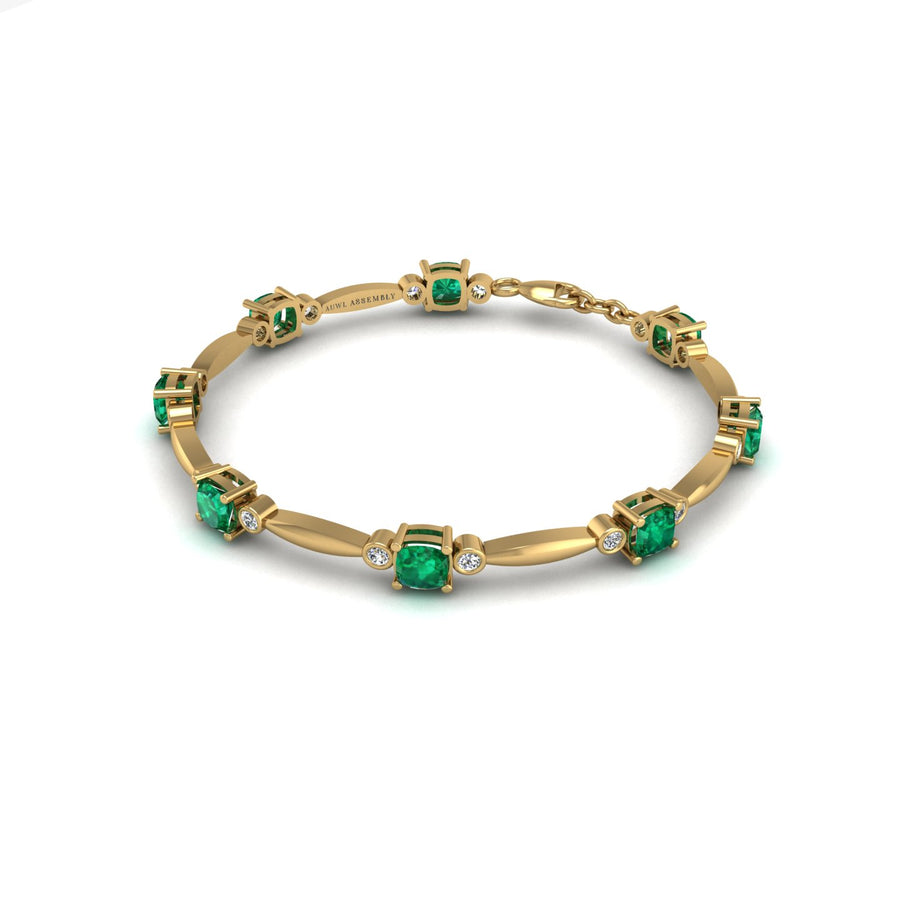 Gold emerald cushion stardust designer bracelet